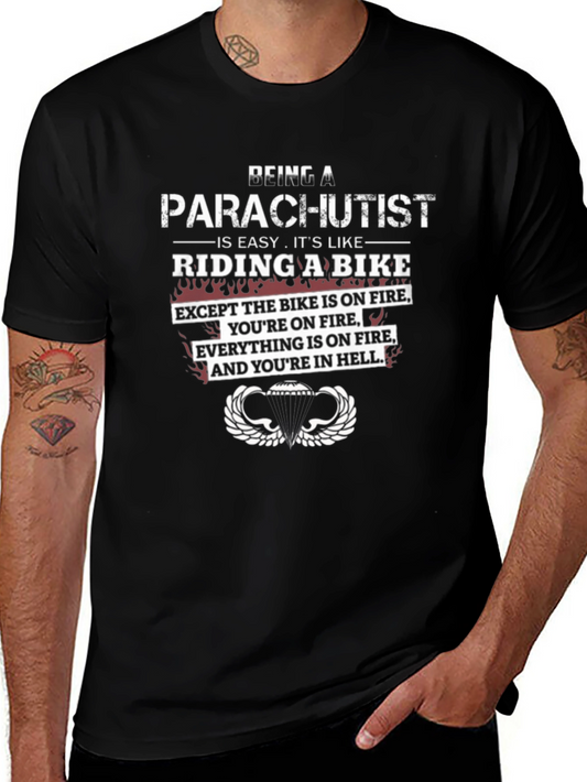 Parachutist Riding a Bike Graphic Tee